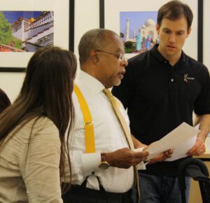 Professor Henry Louis Gates Jr. and 23andMe scientists going over their interview before filming of Finding Your Roots at 23andeMe headquarters.