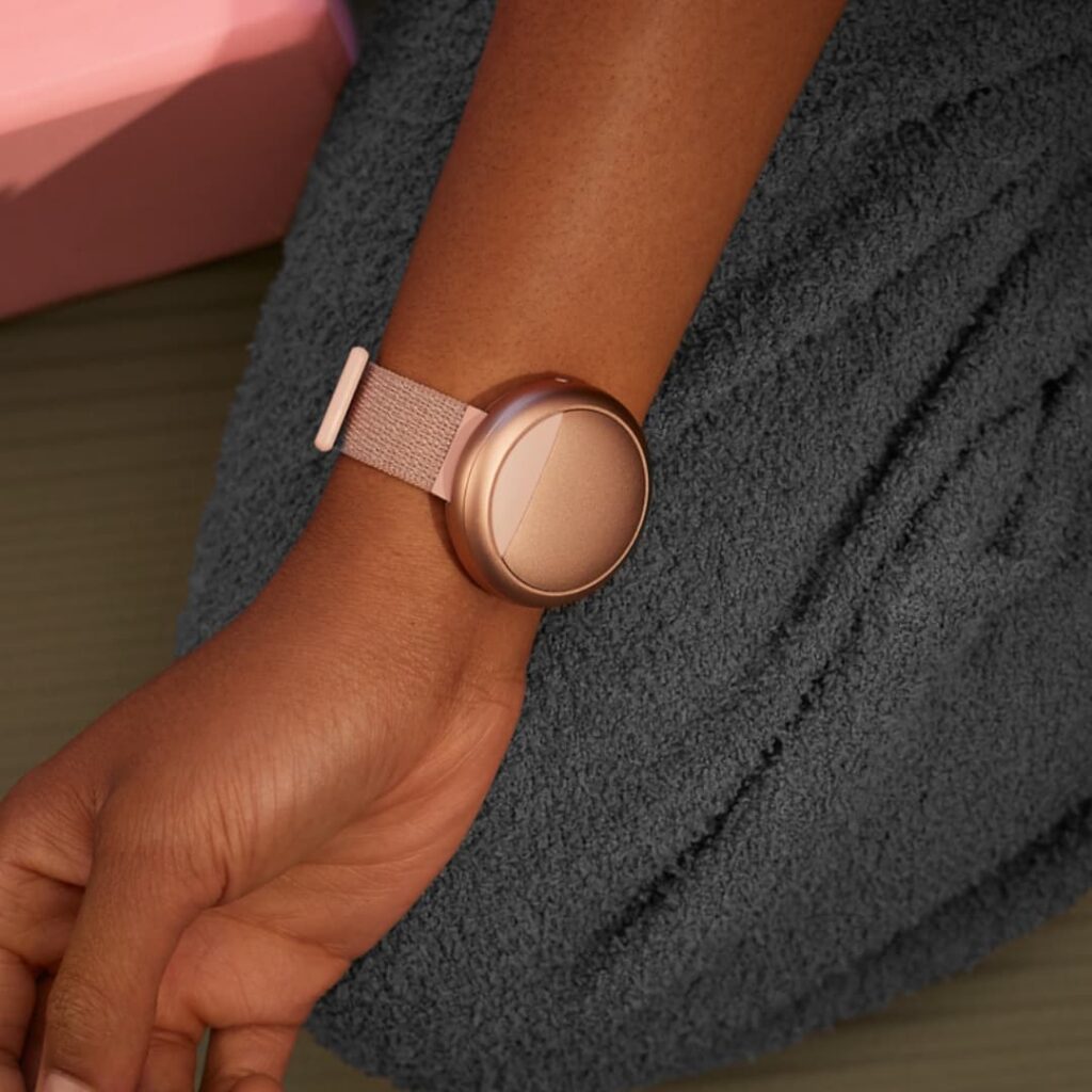 A slim thermal wristband worn on the inside of a wrist.